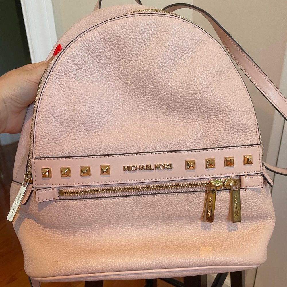 Pink leather Michael Kors mini backpack